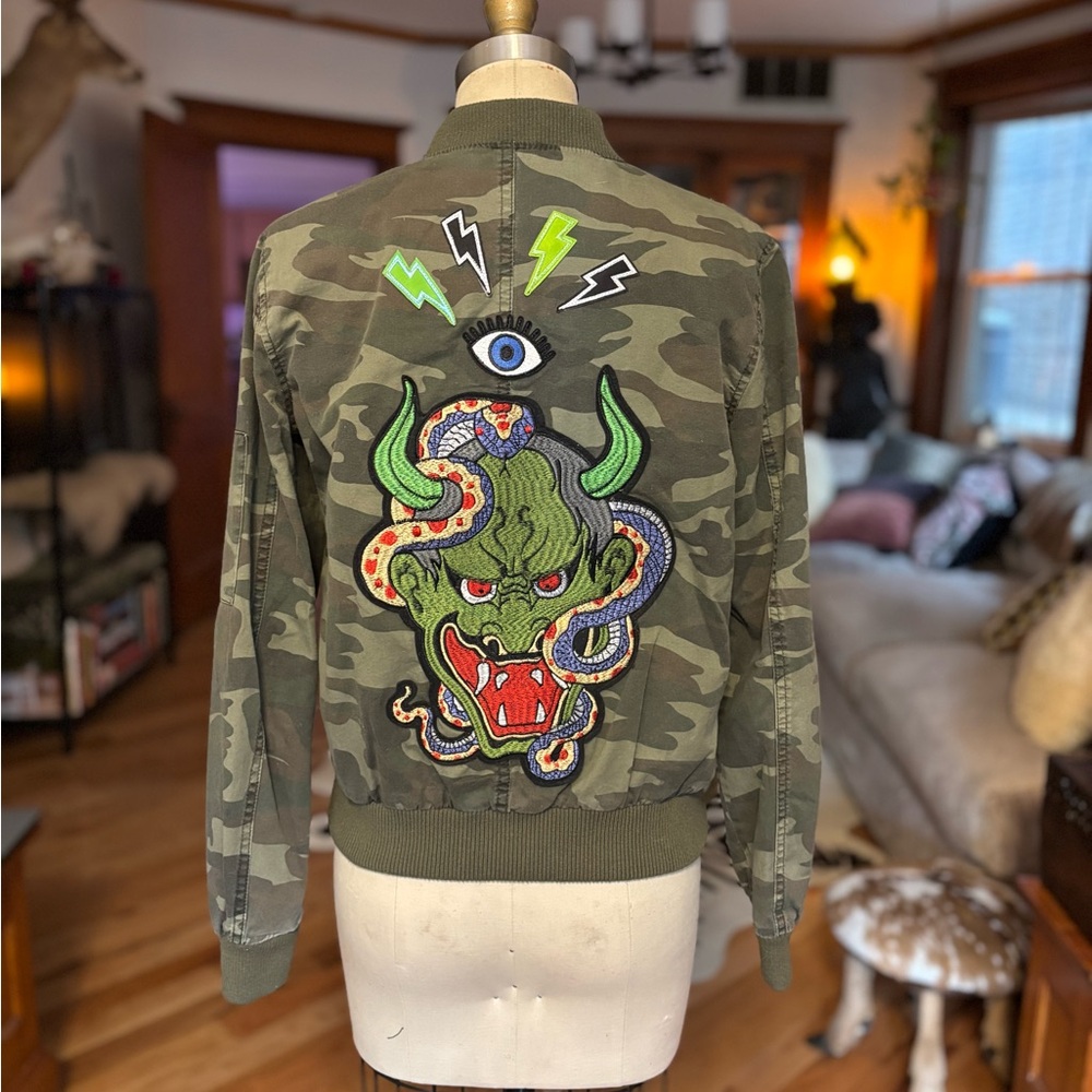 Camouflage Bomber Jacket with Embroidered Design